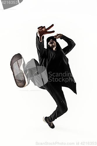 Image of The silhouette of one hip hop male break dancer dancing on white background