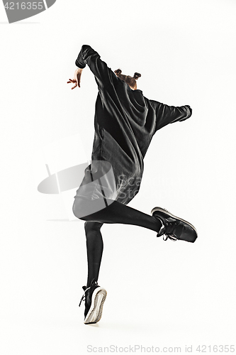 Image of The silhouette of one hip hop male break dancer dancing on white background