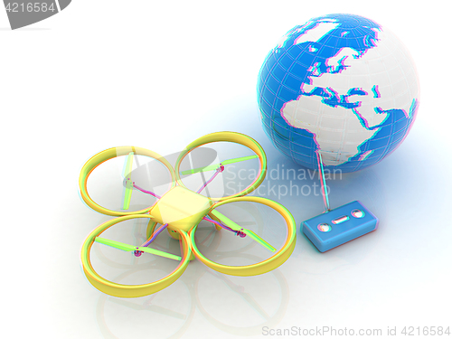 Image of Quadrocopter Drone with Earth Globe and remote controller on a w