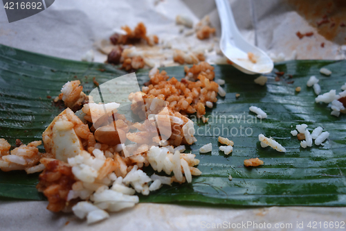 Image of Leftover rice on banana leave