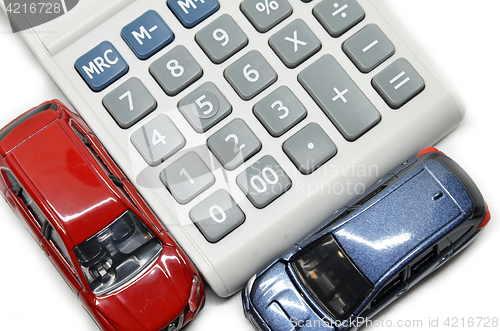 Image of Blue and red car with calculator 