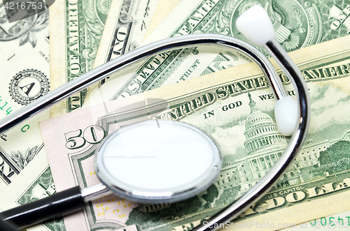 Image of US dollar and stethoscope