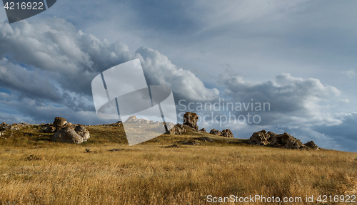 Image of Mountain plateau in the background of the cloudy sky