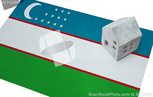 Image of Small house on a flag - Uzbekistan