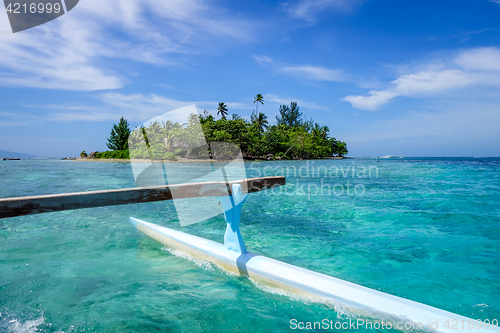 Image of Pirogue on the way to paradise tropical atoll in Moorea Island l