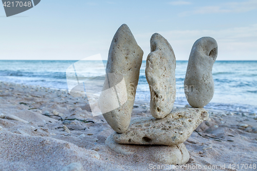 Image of stone piles on the beach