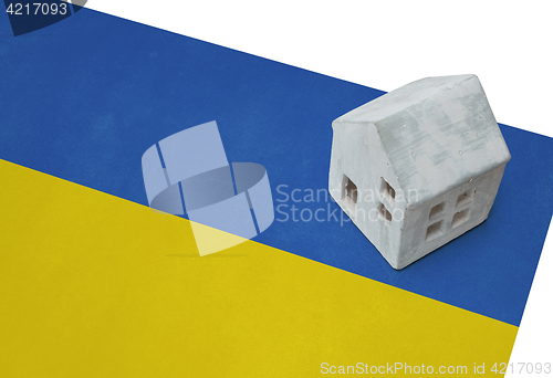 Image of Small house on a flag - Ukraine