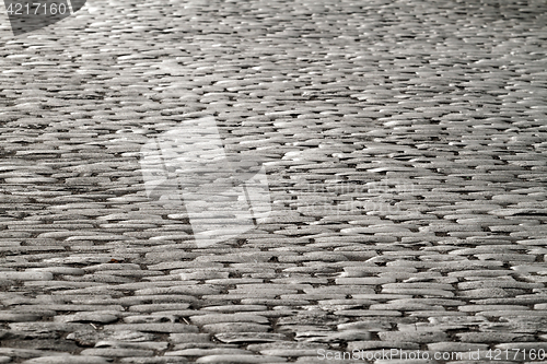 Image of Cobblestones illuminated by moonlight