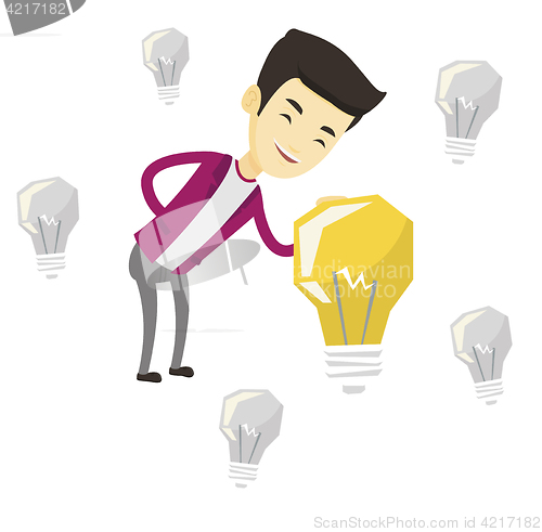 Image of Asian businessman having business idea.