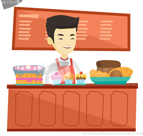 Image of Worker standing behind the counter at the bakery.