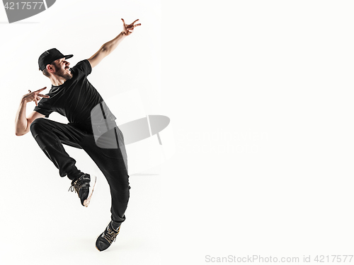 Image of The silhouette of one hip hop male break dancer dancing on white