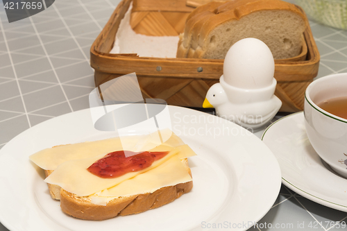 Image of Breakfast with toast,tea and egg