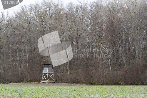 Image of Hunting tower by a forest