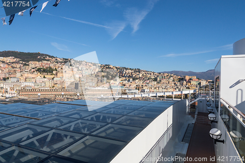 Image of Cityscape view of Genoa from upper deck of cruise liner
