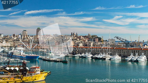 Image of Serene panoramic view of old port in Genoa with cityscape