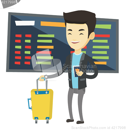 Image of Man with suitcase and ticket at the airport.