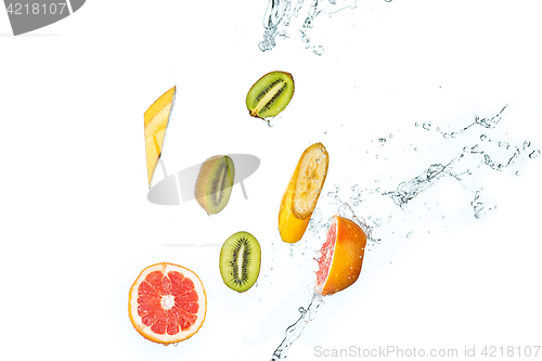 Image of Fresh fruits falling in water splash, isolated on white background