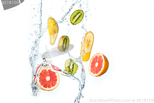 Image of Fresh fruits falling in water splash, isolated on white background