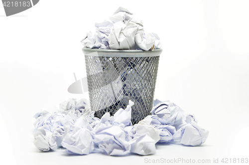 Image of Garbage bin with paper waste