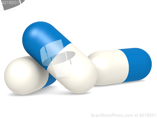 Image of Medicine capsules isolated blue and white