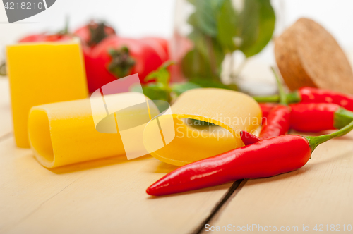 Image of Italian pasta paccheri with tomato mint and chili pepper