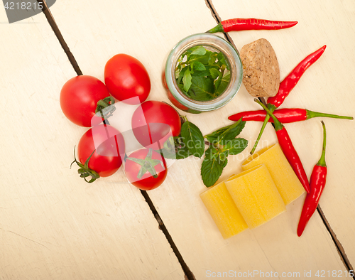 Image of Italian pasta paccheri with tomato mint and chili pepper