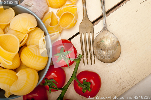 Image of Italian snail lumaconi pasta with tomatoes