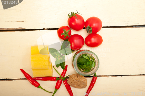 Image of Italian pasta paccheri with tomato mint and chili pepper