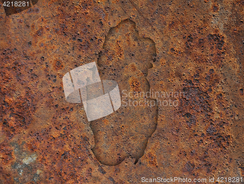 Image of Map of Qatar on rusty metal