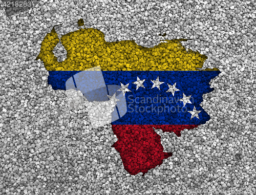 Image of Map and flag of Venezuela on poppy seeds