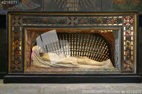 Image of Jesus is laid in the Tomb