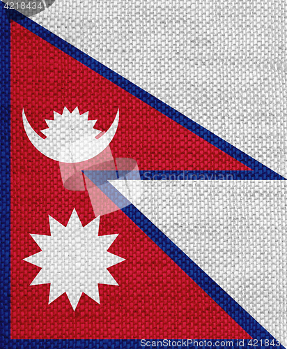 Image of Flag of Nepal on old linen