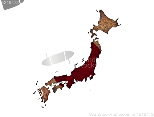 Image of Map and flag of Japan on rusty metal