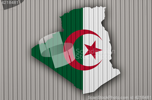 Image of Map and flag of Algeria on corrugated iron