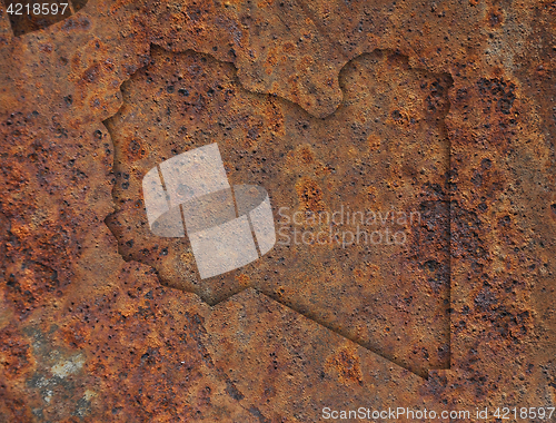 Image of Map of Libya on rusty metal