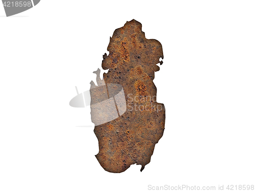 Image of Map of Qatar on rusty metal