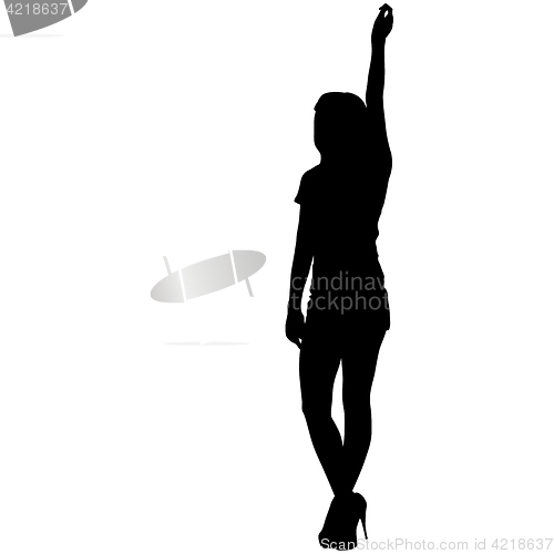 Image of Black silhouette woman standing with arm raised, people on white background