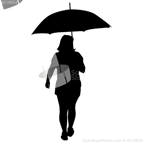 Image of Black silhouettes of women under the umbrella