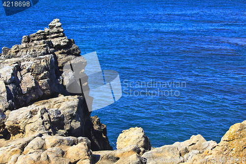 Image of Rocky Coast Extending into the Sea