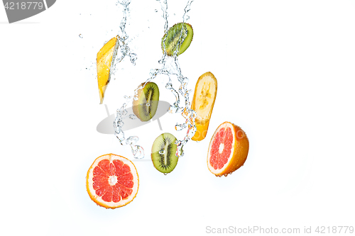 Image of Fresh fruits falling in water splash, isolated on white background