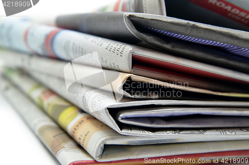 Image of Newspapers folded and stacked