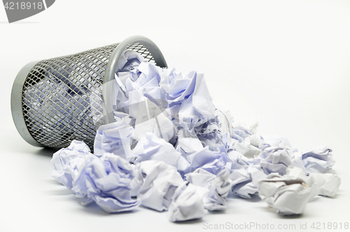 Image of Garbage bin with paper waste