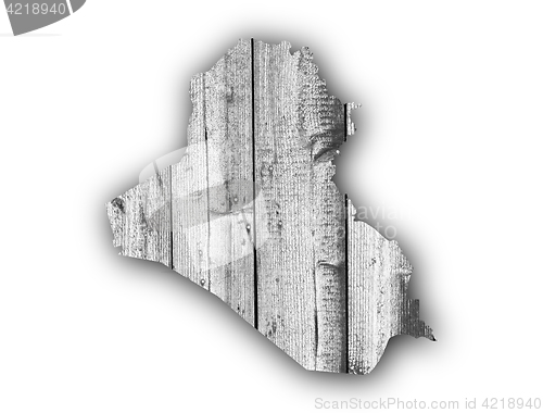 Image of Map of Iraq on weathered wood