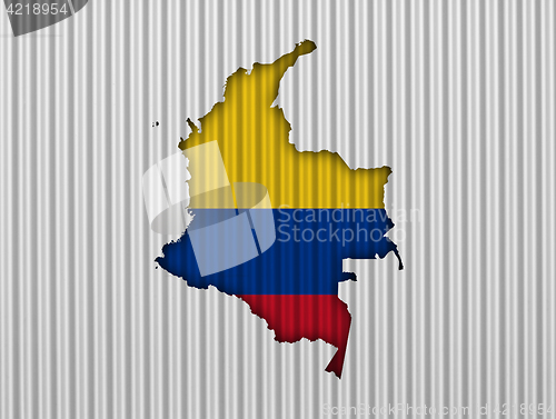 Image of Map and flag of Colombia on corrugated iron