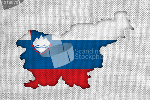 Image of Map and flag of Slovenia on old linen