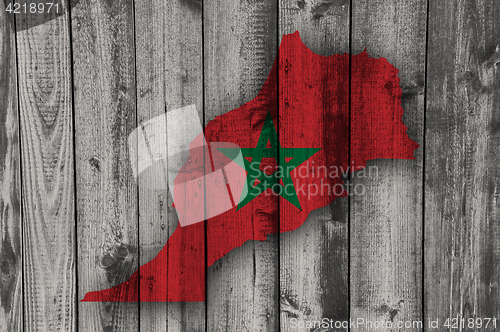 Image of Map and flag of Morocco on weathered wood