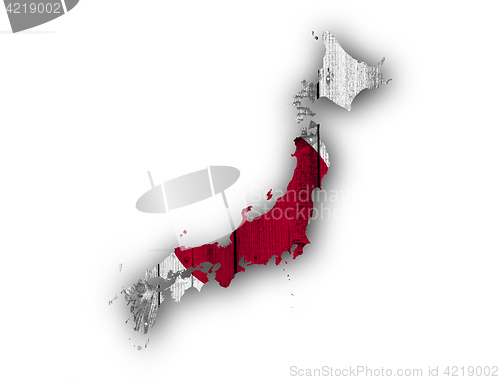 Image of Map and flag of Japan on weathered wood