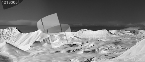 Image of Black and white panoramic view on snowy plateau in winter