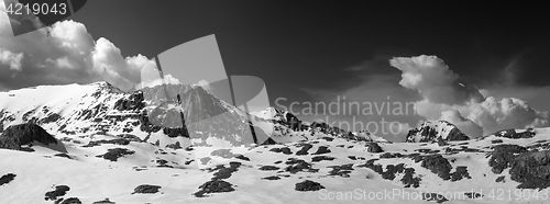 Image of Black and white panorama of snowy winter mountains