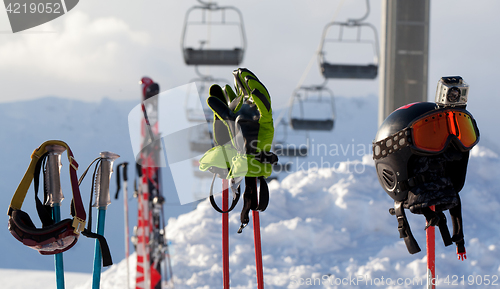 Image of Protective sports equipment on ski poles at ski resort